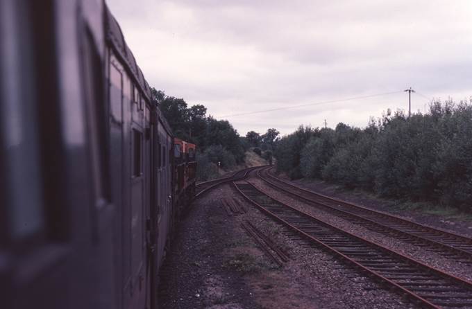 A train on the railway tracks

Description automatically generated with medium confidence